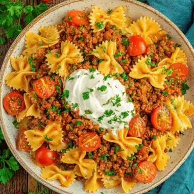 The Ultimate Anna Paul Turkish Pasta 3 Hearty farfalle pasta with seasoned ground meat, cream, and herbs, showcasing the rich flavors of anna paul turkish pasta.