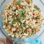 Amazing Asian Pasta Salad: Quick & Flavorful 5 Vibrant asian pasta salad with bowtie pasta, shredded chicken, carrots, and fresh cilantro.