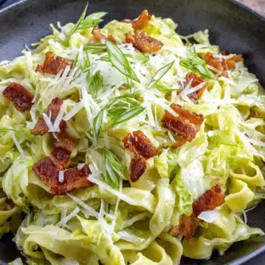 Wonderful Homemade Cabbage Dumplings 3 Hearty pasta dish with wilted cabbage and bacon, evoking the comfort of classic cabbage dumplings.