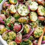 Magical No Mayo Potato Salad: Quick & Zesty 7 Vibrant no mayo potato salad with red-skinned potatoes, fresh herbs, and red onion in a rustic bowl, ready to serve.