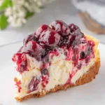 Simple No-Bake Cherry Cheesecake Recipe 7 Delectable slice of cherry cheesecake with vibrant cherry compote and a golden crust, an irresistible cherry cheesecake recipe.